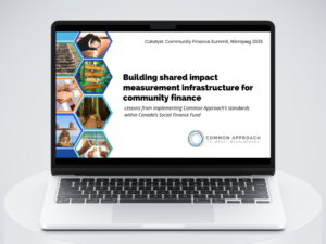 A laptop sits open, with a presentation title slide showing. The title reads, "Building shared impact measurement infrastructure for community finance." 